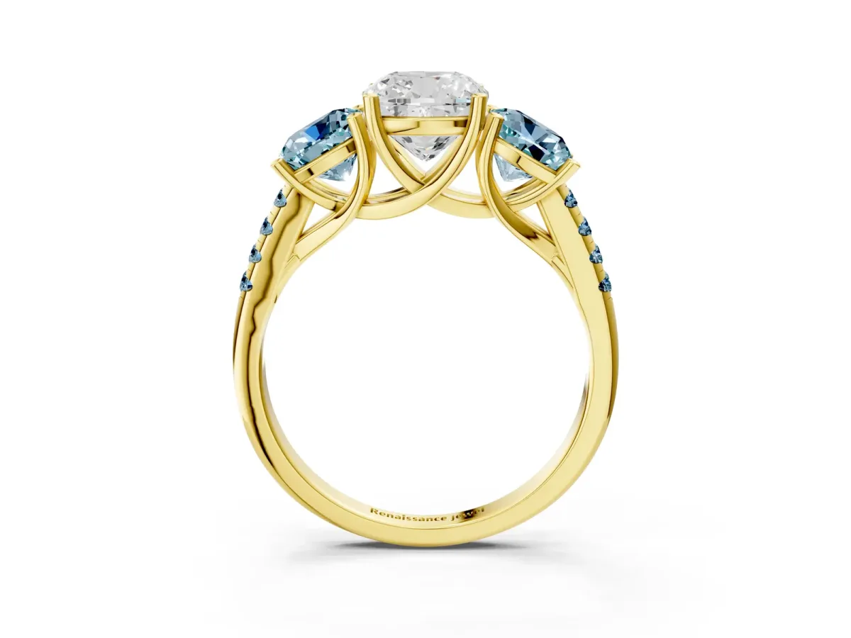 Three-Stone Cushion Cut Diamond Ring with Round Aquamarine Pavé Band and Prong Setting Yellow gold