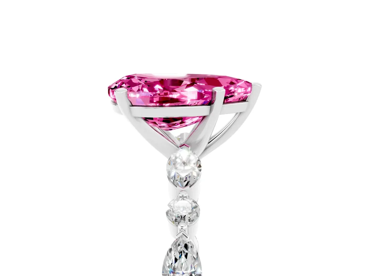 Pear Cut Pink Sapphire Ring with Marquise and Round Side Stones and Four-Prong Setting White gold