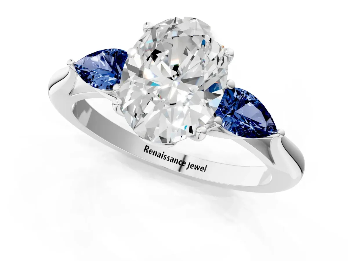 Oval Cut Diamond Three-Stone Ring with Pear Blue Sapphire Side Stones and Prong Setting Silver