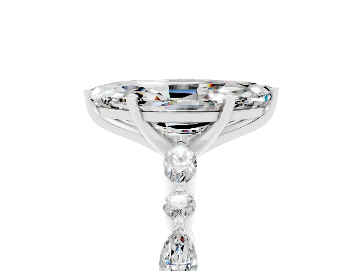 Marquise Cut Moissanite Ring with Marquise and Round Side Stones and Four-Prong Setting White gold
