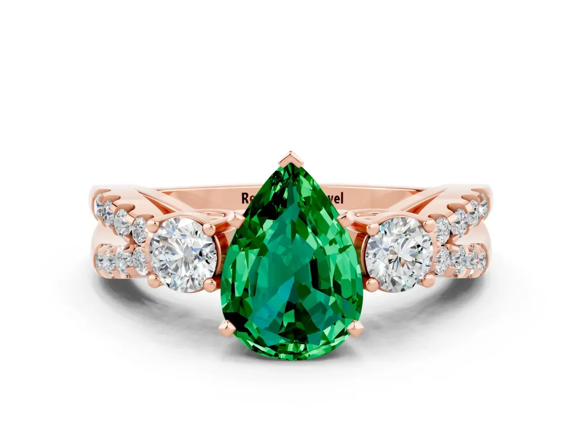 Pear Cut Emerald Three-Stone Ring with Pavé Split Shank and Four-Prong Setting Rose gold