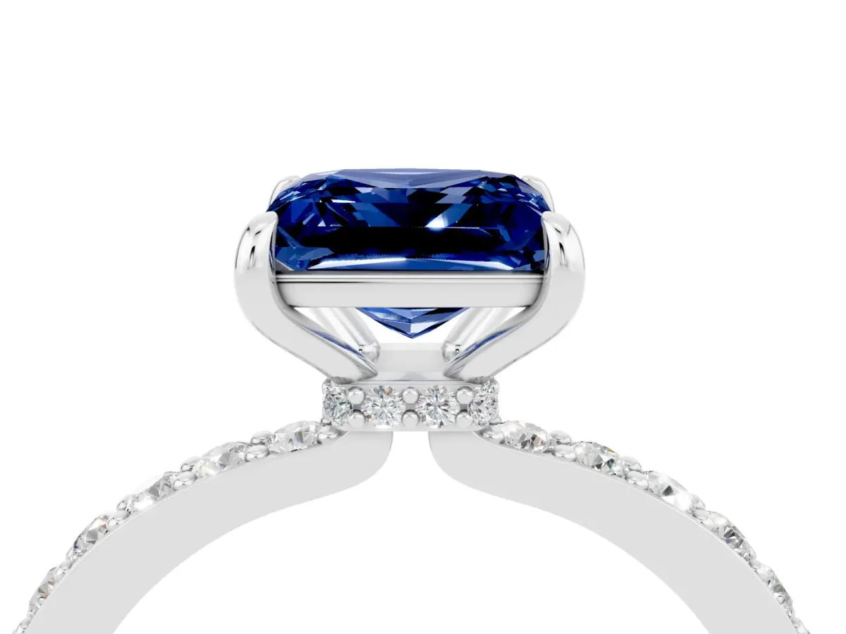 Princess Cut Blue Sapphire Solitaire Engagement Ring with Pavé Band and Four-Prong Setting White gold