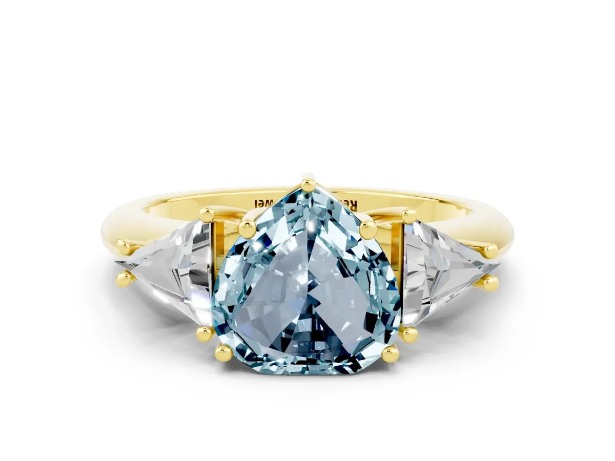 Three-Stone Heart Cut Aquamarine Engagement Ring with Trillion Side Stones and Prong Setting Yellow gold