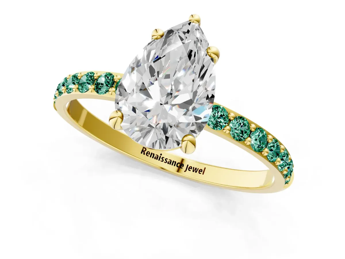 Pear Cut Diamond Solitaire Ring with Round Green Sapphire Pavé Band and Prong Setting Yellow gold