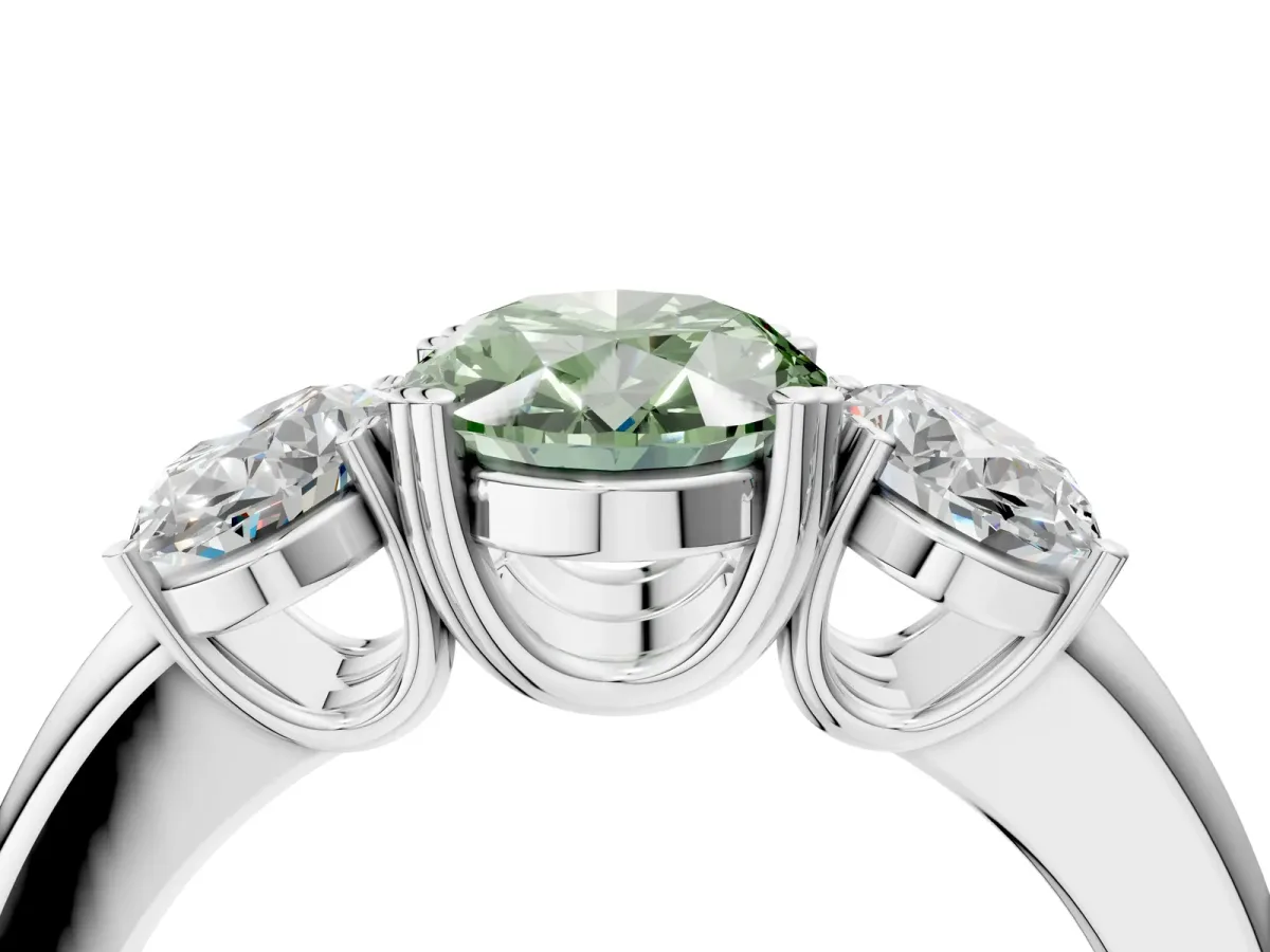Fancy Green Three-Stone Oval Cut Cut Diamond Ring with Channel Set Band and Four-Prong Setting Silver