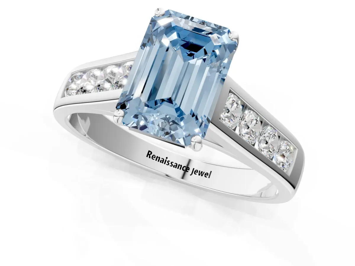 Fancy Blue Emerald Cut Brilliant Channel-Set Solitaire Ring with Four-Prong Setting White gold