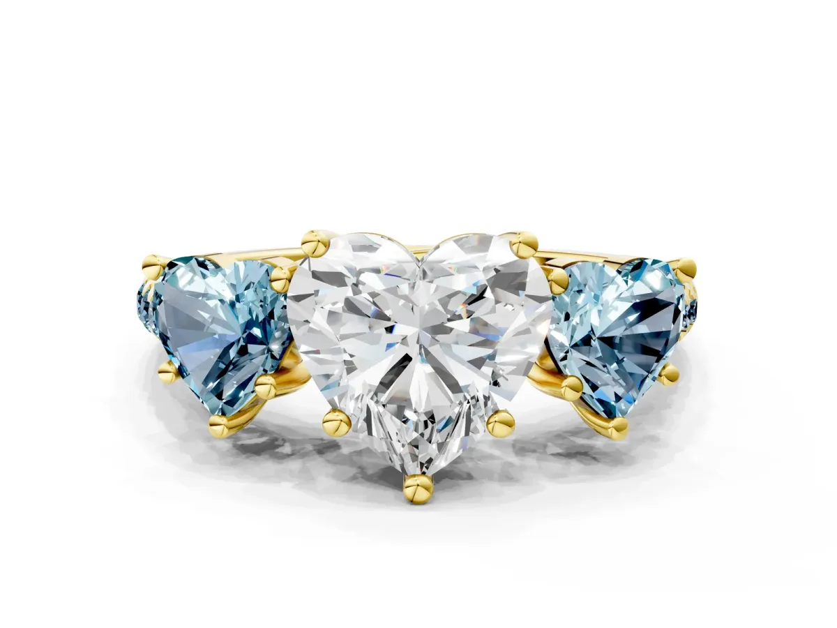 Three-Stone Heart Cut Diamond Ring with Round Aquamarine Pavé Band and Prong Setting Yellow gold