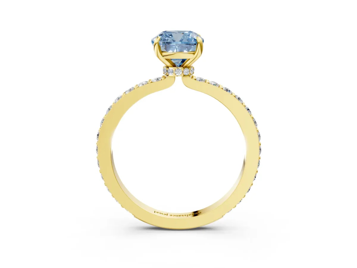 Fancy Blue Cushion Cut Diamond Solitaire Engagement Ring with Pavé Band and Four-Prong Setting Yellow gold