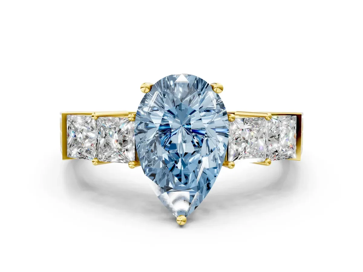 Fancy Blue Pear Cut Solitaire Princess Side Stone Engraved Band Prong Setting Ring Yellow gold
