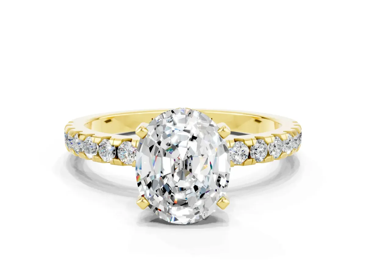 Oval Cut Moissanite Solitaire Ring with Round Pavé Band and Four-Prong Setting Yellow gold