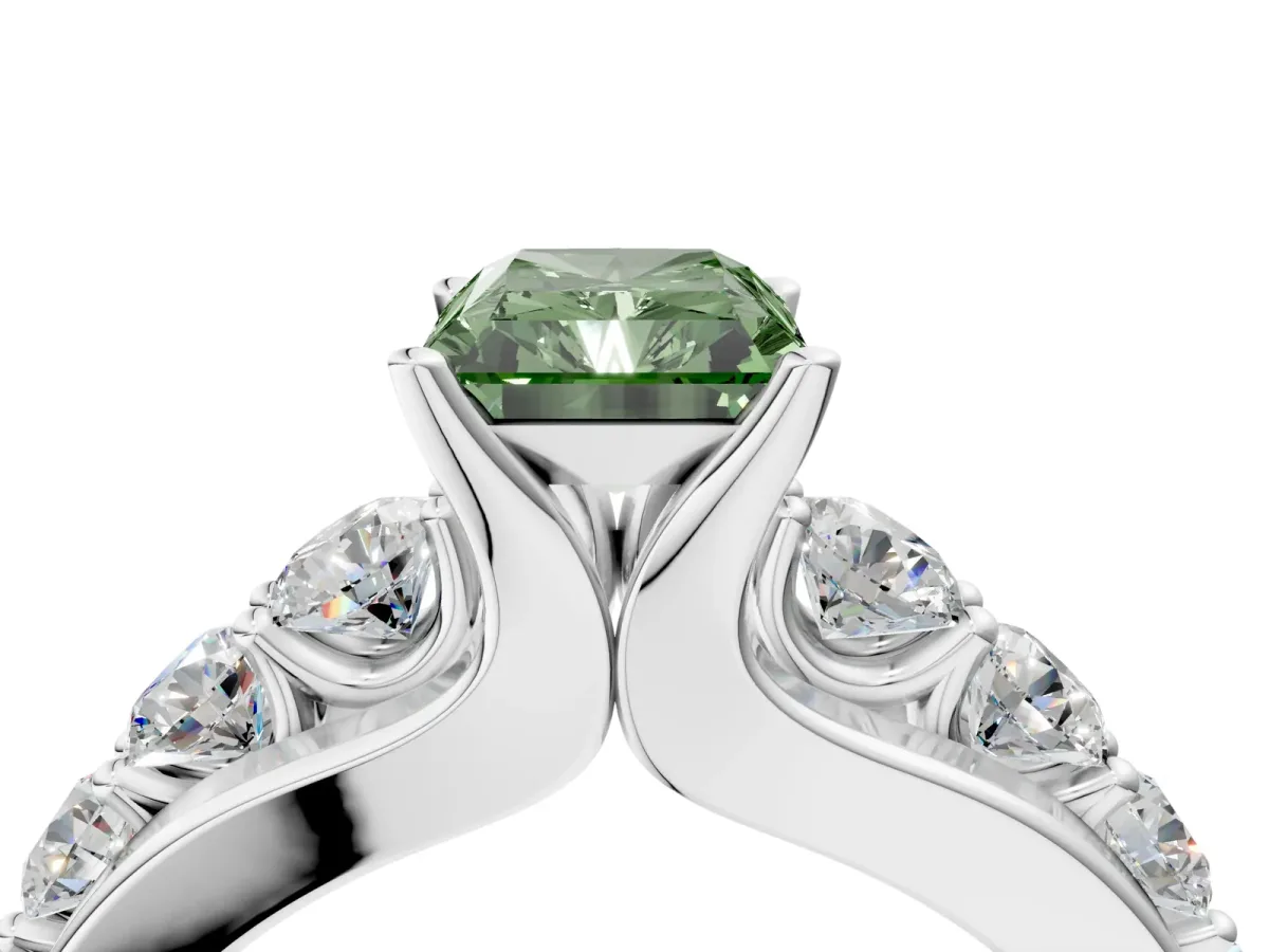 Fancy Green Radiant Cut Brilliant Solitaire with Side Stones on a Pave Band and Four-Prong Setting Platinum