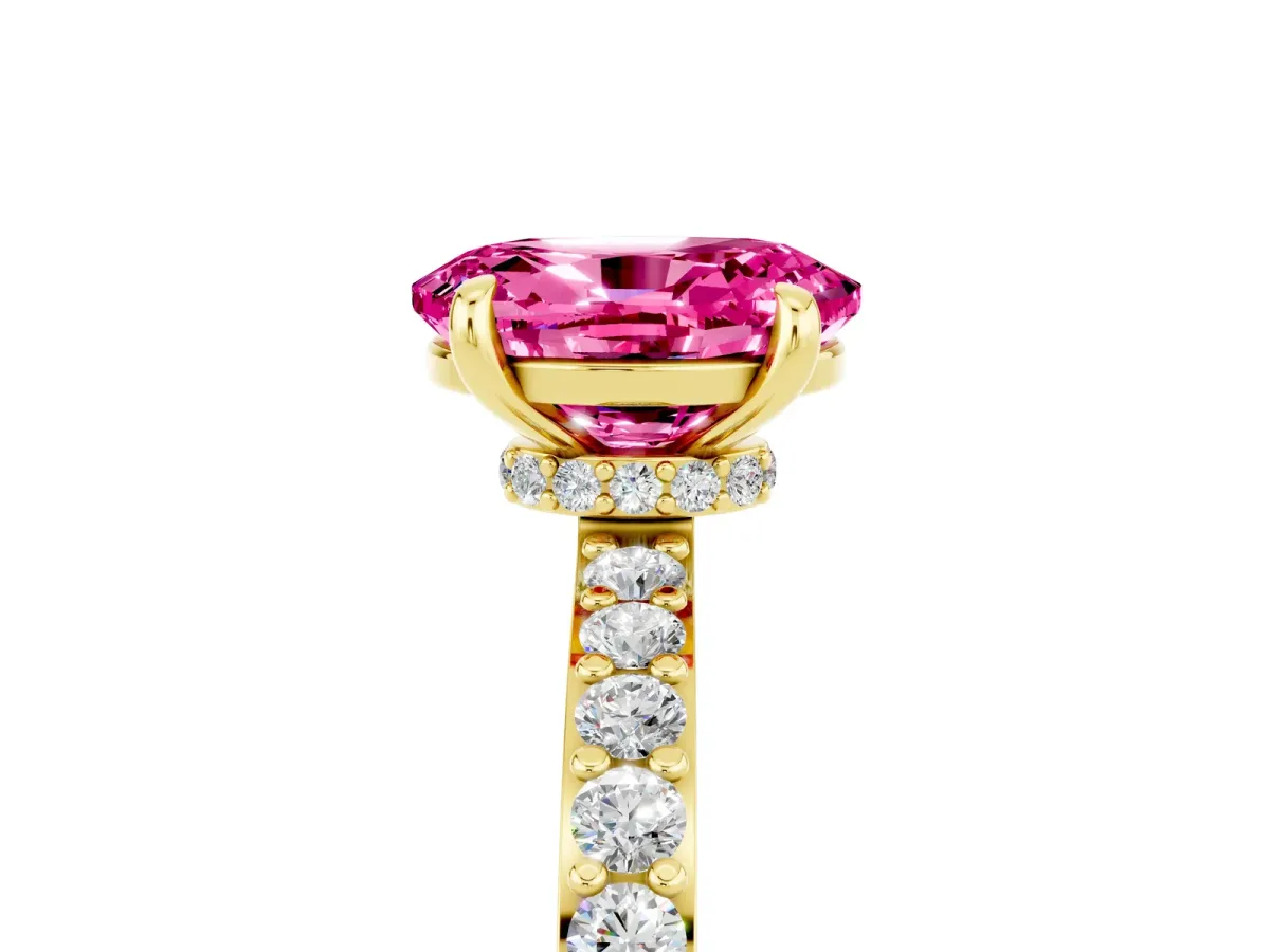 Oval Cut Pink Sapphire Solitaire Engagement Ring with Pavé Band and Four-Prong Setting Yellow gold