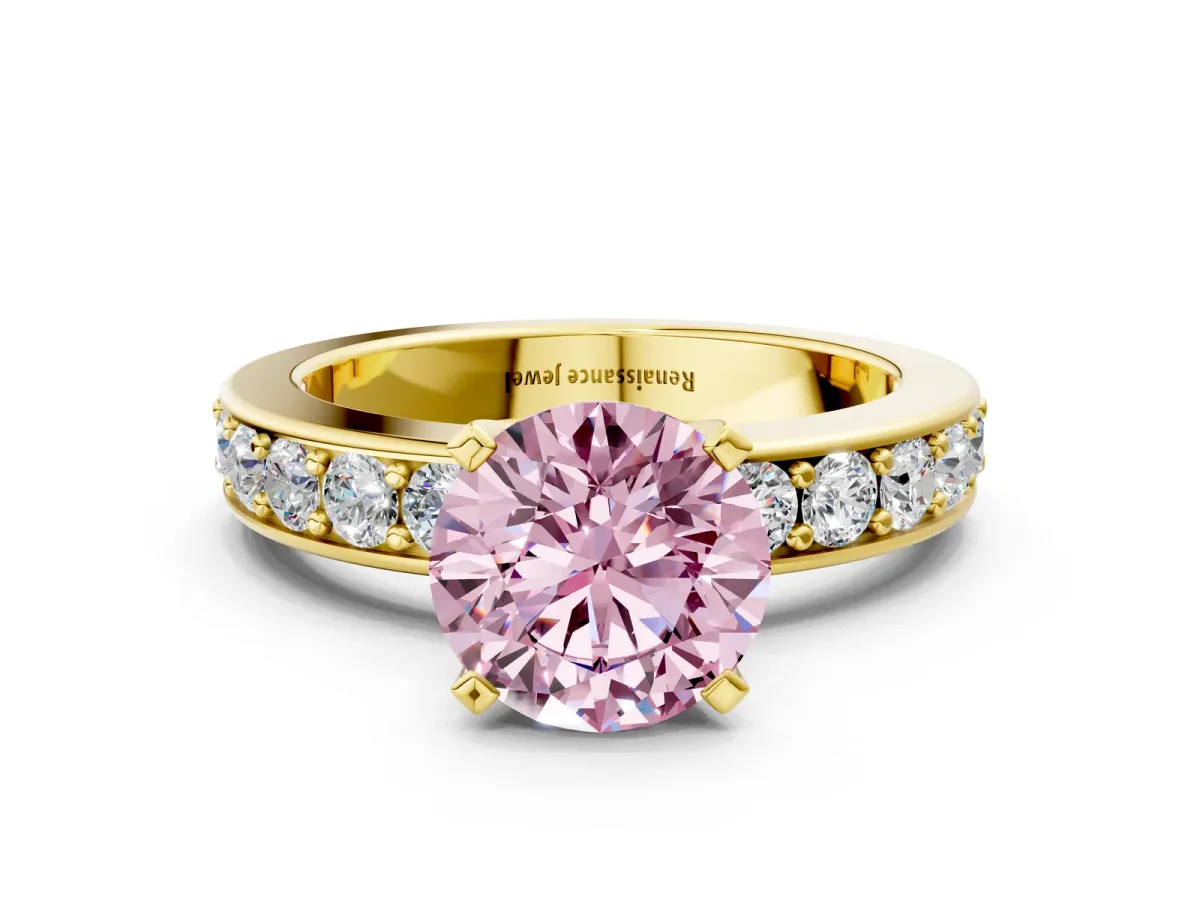 Fancy Pink Round Cut Diamond Engagement Ring with Channel Set Round Band and Prong Setting Yellow gold
