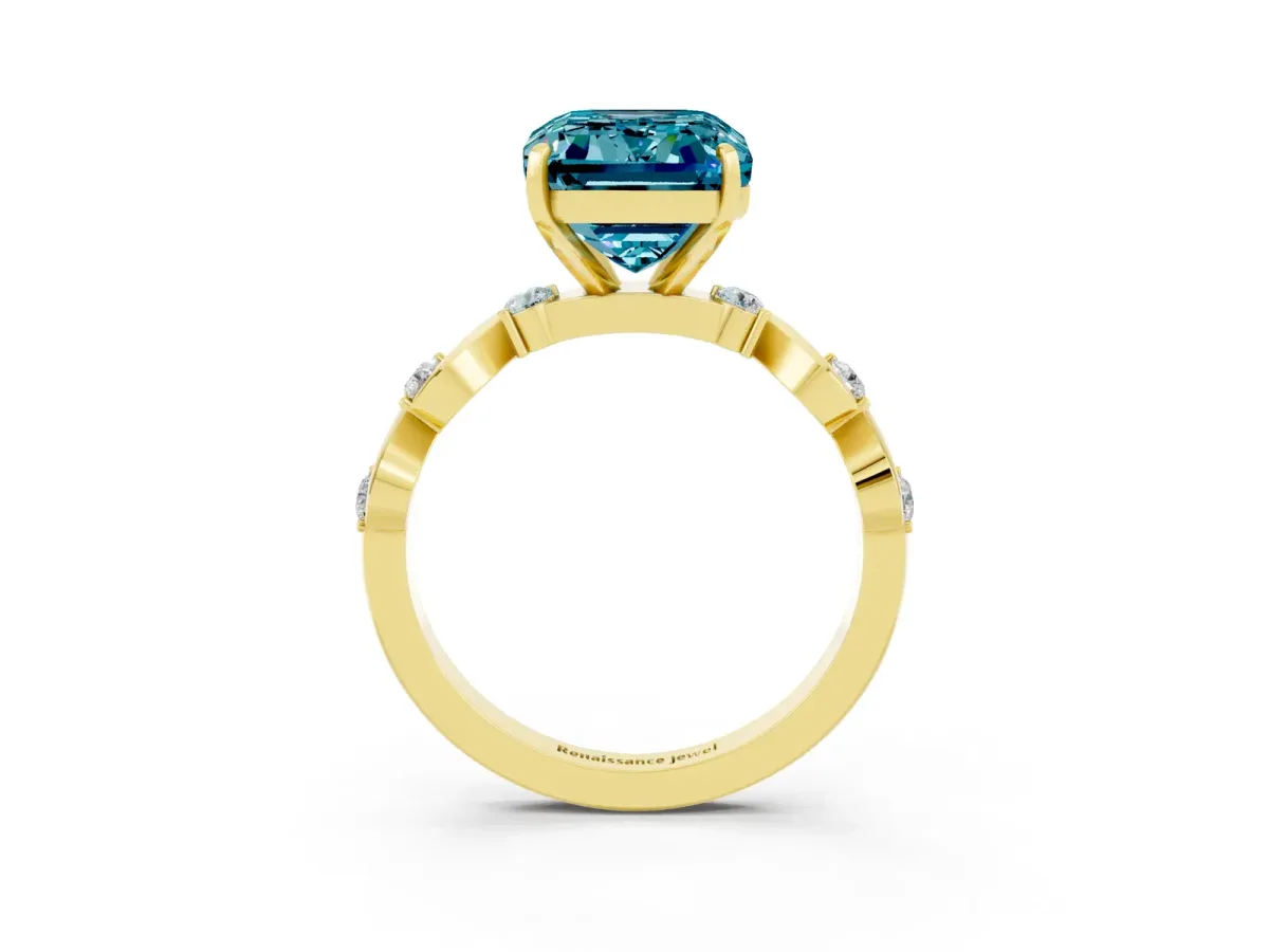 Emerald Cut Blue Topaz Solitaire Twisted Band with Round Accents and Prong Setting Yellow gold