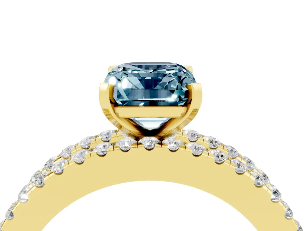 Emerald Cut Aquamarine Solitaire Ring with Pavé and Channel Set Band Yellow gold