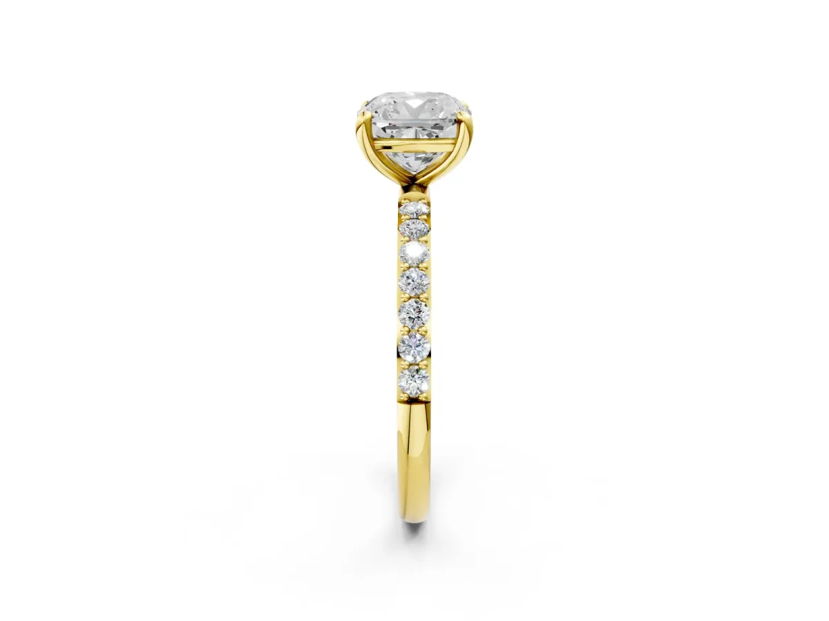 Cushion Cut Diamond Solitaire Ring with Round Moissanite Pavé Band and Prong Setting Yellow gold