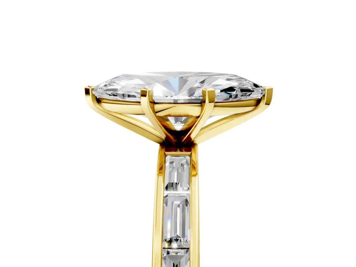 Marquise Cut Solitaire Diamond Ring with Channel-Set Baguette Band and Four-Prong Setting Yellow gold