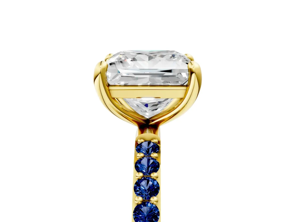 Princess Cut Diamond Solitaire Ring with Round Blue Sapphire Pavé Band and Prong Setting Yellow gold