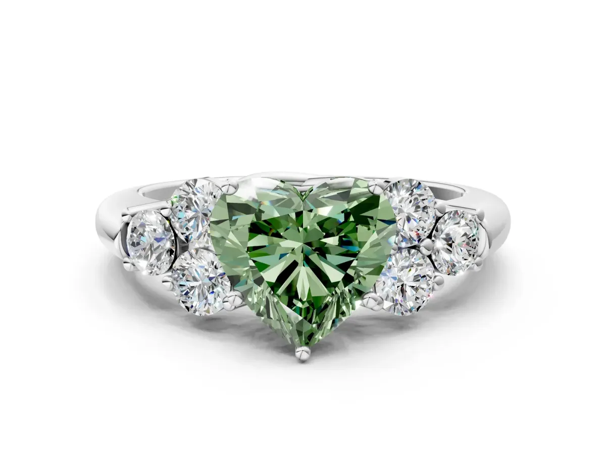 Fancy Green Heart Cut Cut Diamond Cluster Ring with Round Accent Stones and Prong Setting on a Classic Band Platinum