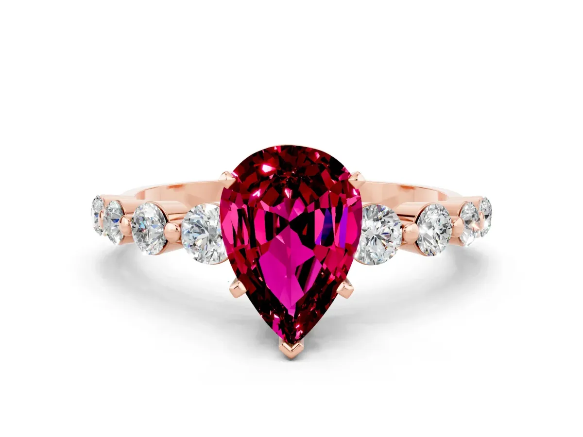Pear Cut Solitaire Garnet Ring with Pave Band and Four-Prong Setting Rose gold
