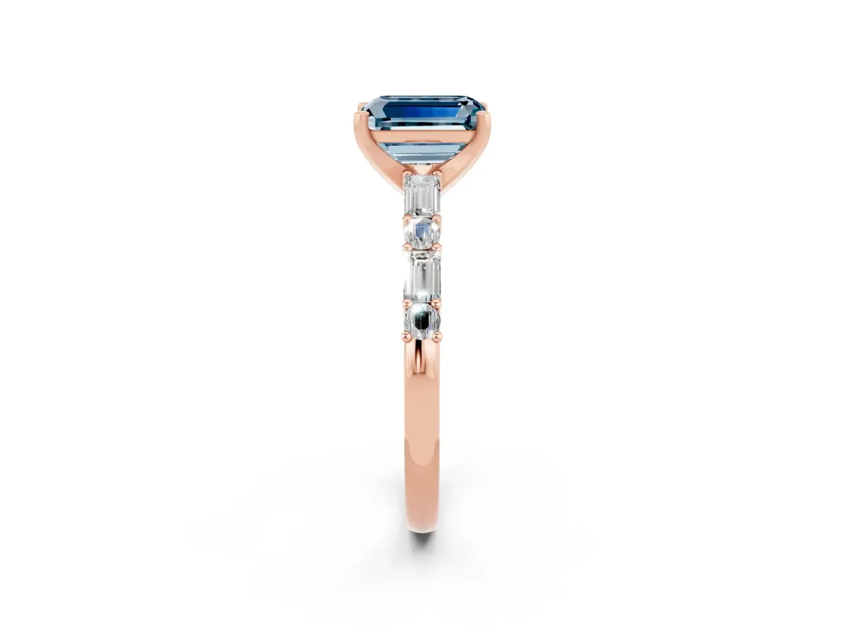 Emerald Cut Aquamarine Solitaire with Side Baguettes and Channel Set Band Rose gold