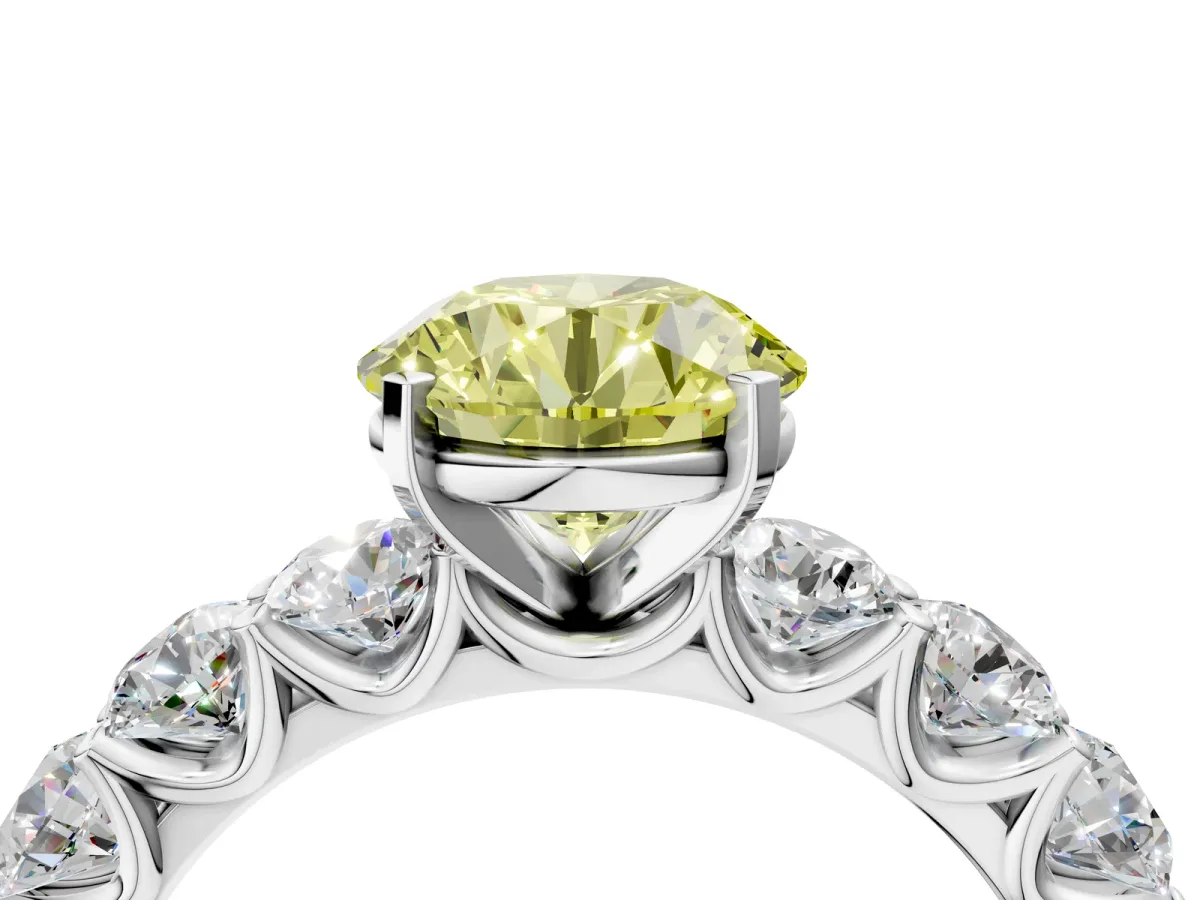 Fancy Yellow Round Cut Diamond Prong Setting with Side Stones on a Pave Band Silver