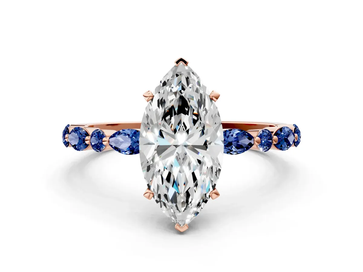 Marquise Cut Diamond Ring with Marquise and Round Blue Sapphire Side Stones and Four-Prong Setting Rose gold