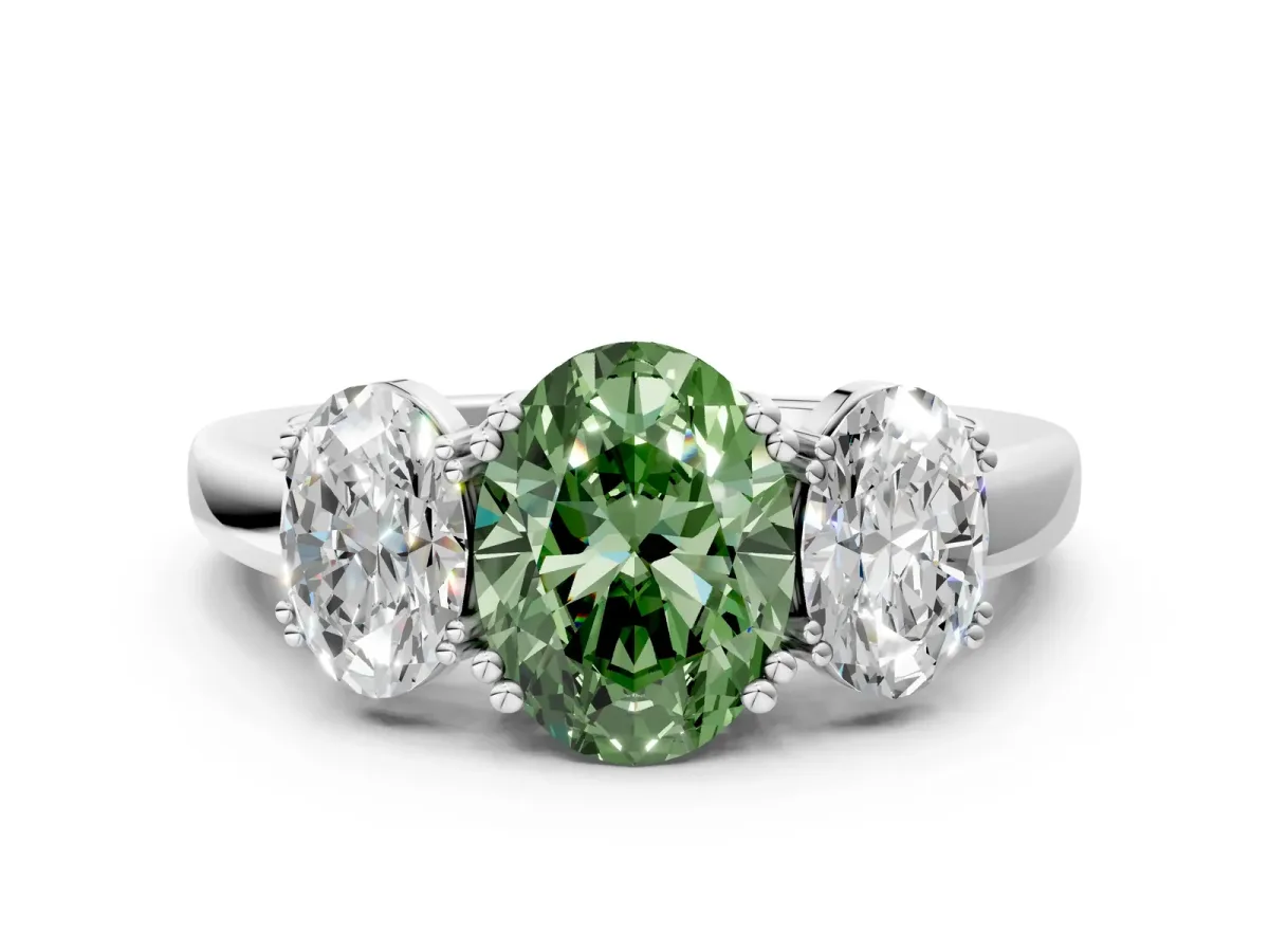 Fancy Green Three-Stone Oval Cut Cut Diamond Ring with Channel Set Band and Four-Prong Setting Silver