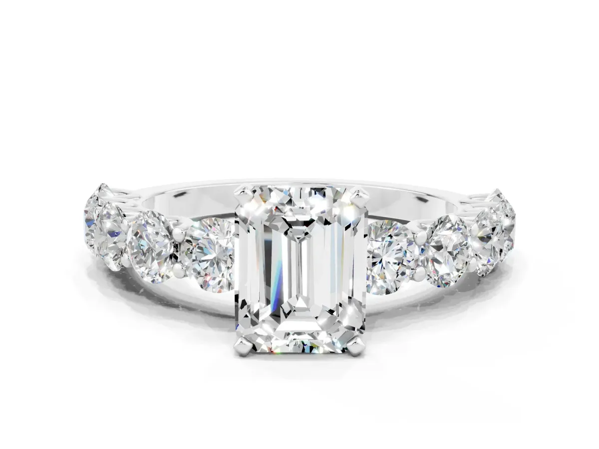 Emerald Cut Moissanite Prong Setting with Side Stones on a Pave Band Silver