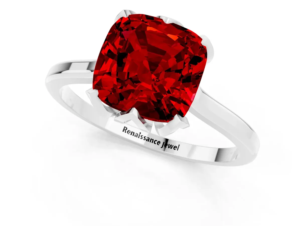Cushion Cut Ruby Solitaire Ring with Flower Prong Setting and Classic Band White gold