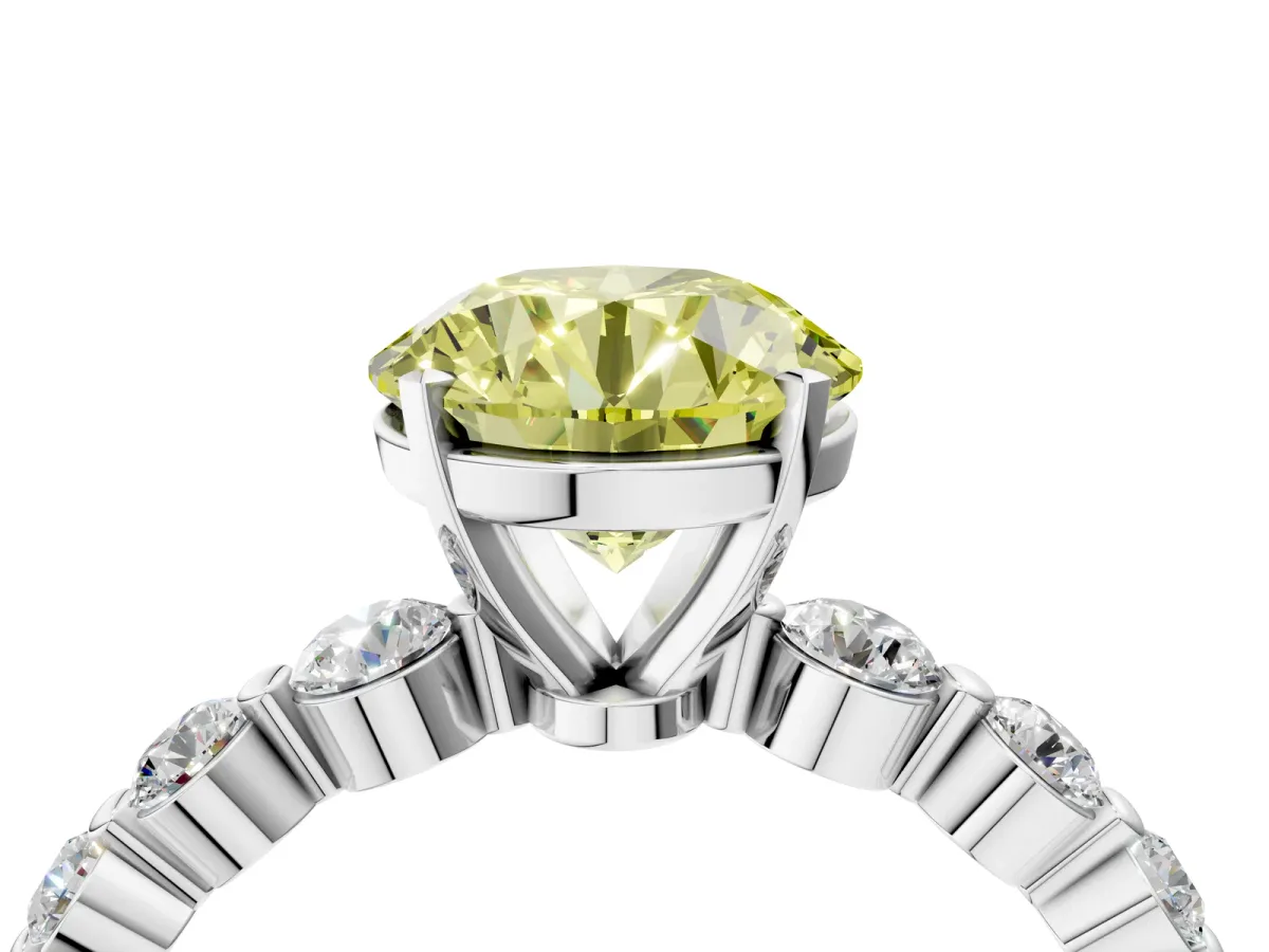 Fancy Yellow Round Cut Solitaire Diamond Ring with Pave Band and Four-Prong Setting Silver