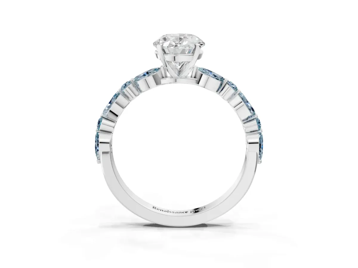 Oval Cut Diamond Ring with Marquise and Round Aquamarine Side Stones and Four-Prong Setting White gold