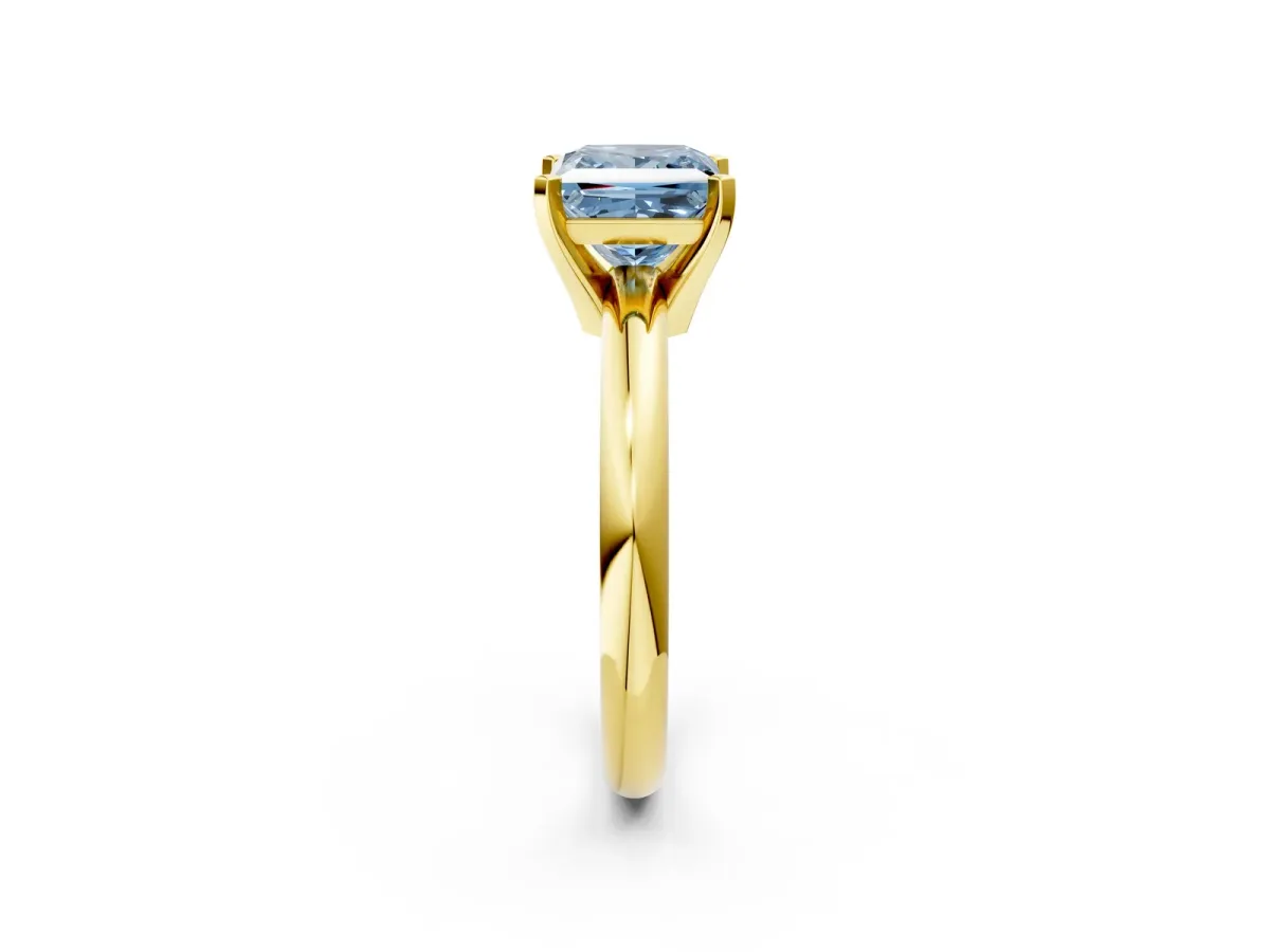 Fancy Blue Princess Cut Diamond Solitaire Engagement Ring with Round Band and Four-Prong Setting Yellow gold