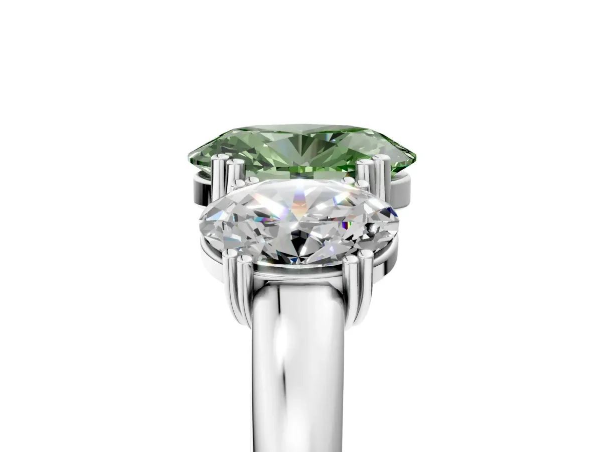 Fancy Green Three-Stone Oval Cut Cut Diamond Ring with Channel Set Band and Four-Prong Setting Silver