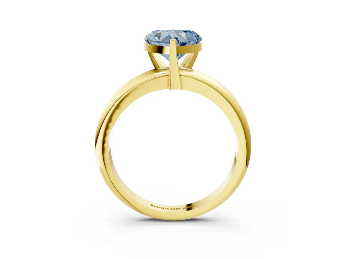 Fancy Blue Heart Cut Diamond Solitaire Engagement Ring with Round Band and Four-Prong Setting Yellow gold