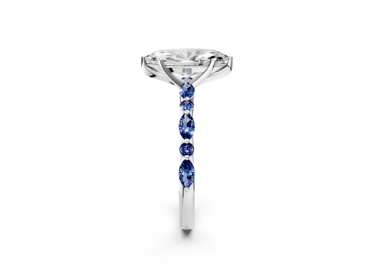 Marquise Cut Diamond Ring with Marquise and Round Blue Sapphire Side Stones and Four-Prong Setting Platinum