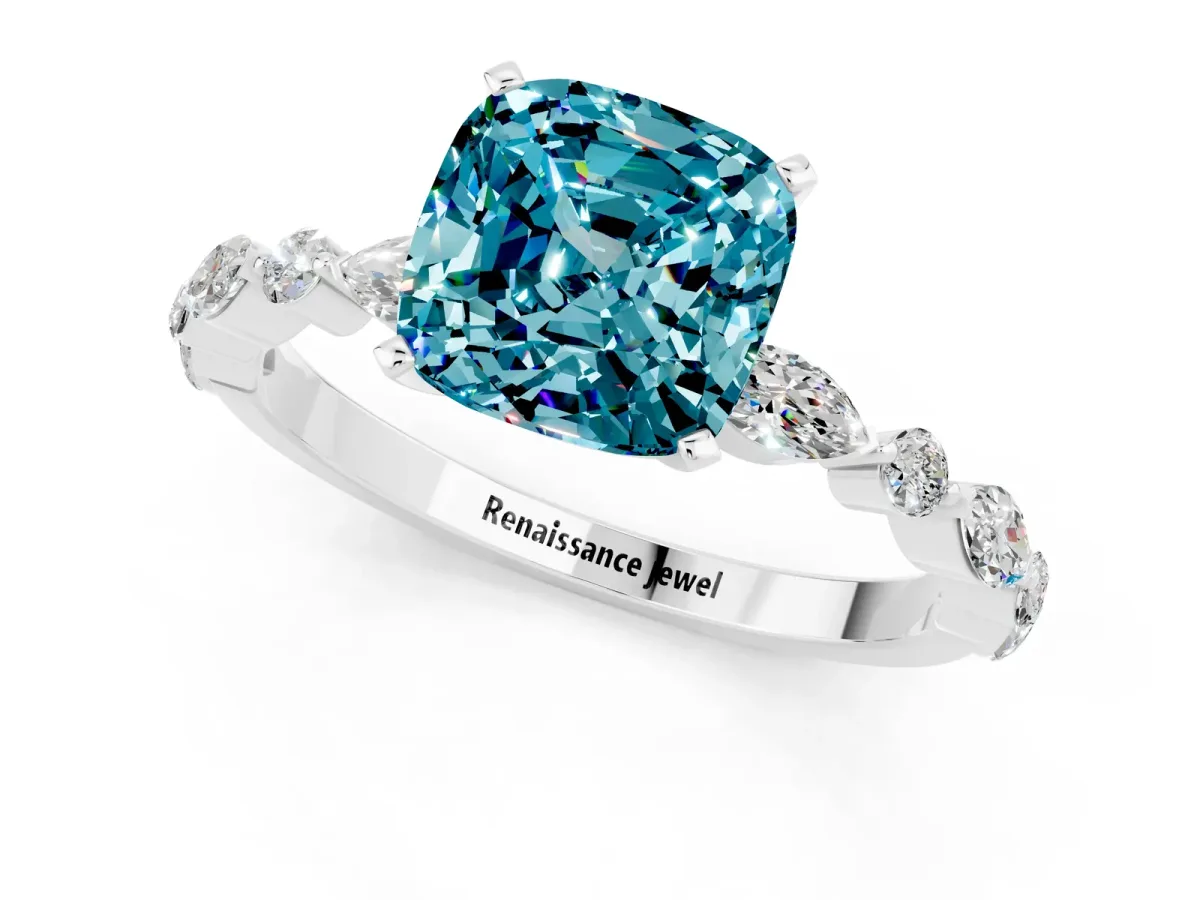 Cushion Cut Blue Topaz Ring with Marquise and Round Side Stones and Four-Prong Setting White gold