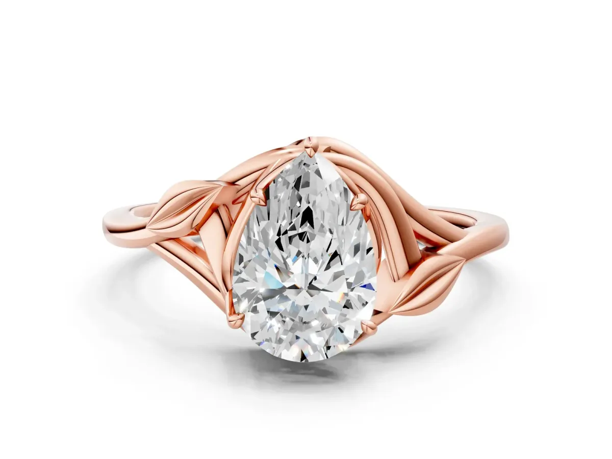 Pear Cut Diamond Solitaire Ring with Twist Band and Four-Prong Setting Rose gold