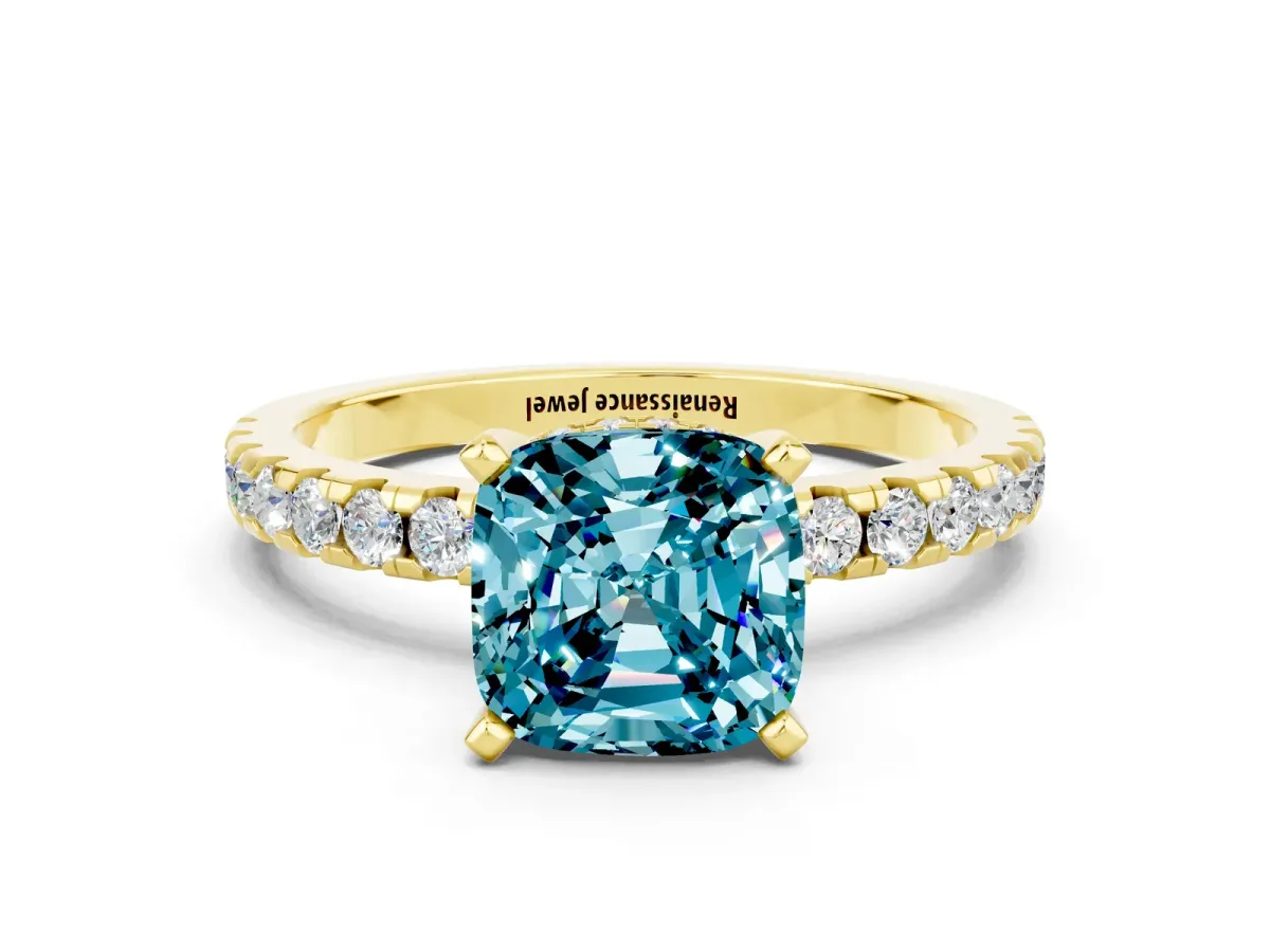 Cushion Cut Blue Topaz Solitaire Ring with Round Pavé Band and Four-Prong Setting Yellow gold