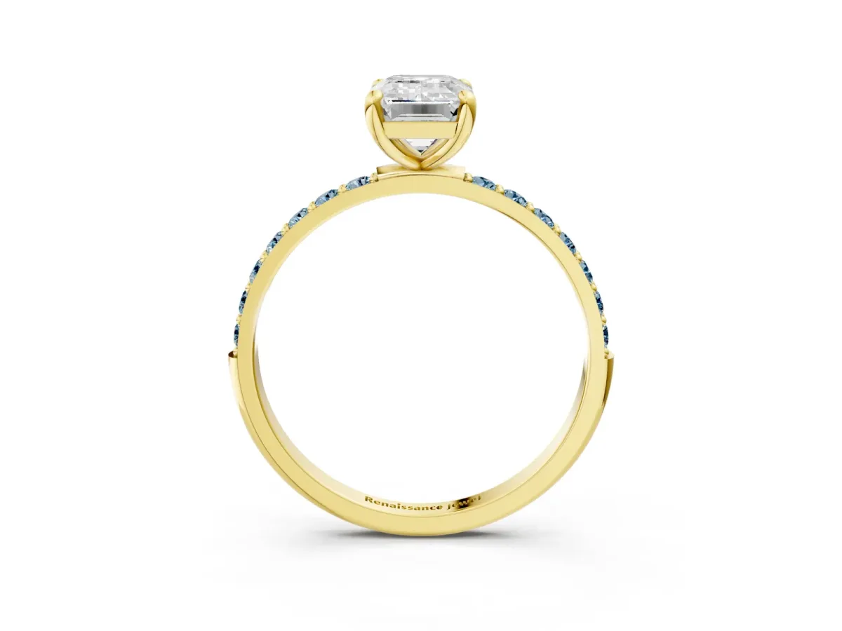 Emerald Cut Diamond Solitaire Ring with Round Aquamarine Pavé Band and Prong Setting Yellow gold