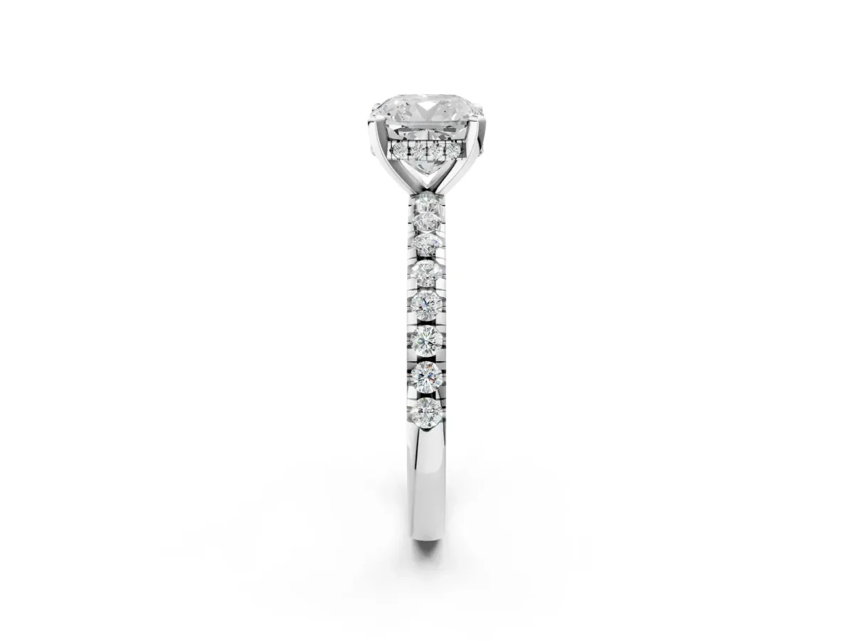 Cushion Cut Diamond Solitaire Ring with Round Moissanite Pavé Band and Four-Prong Setting White gold