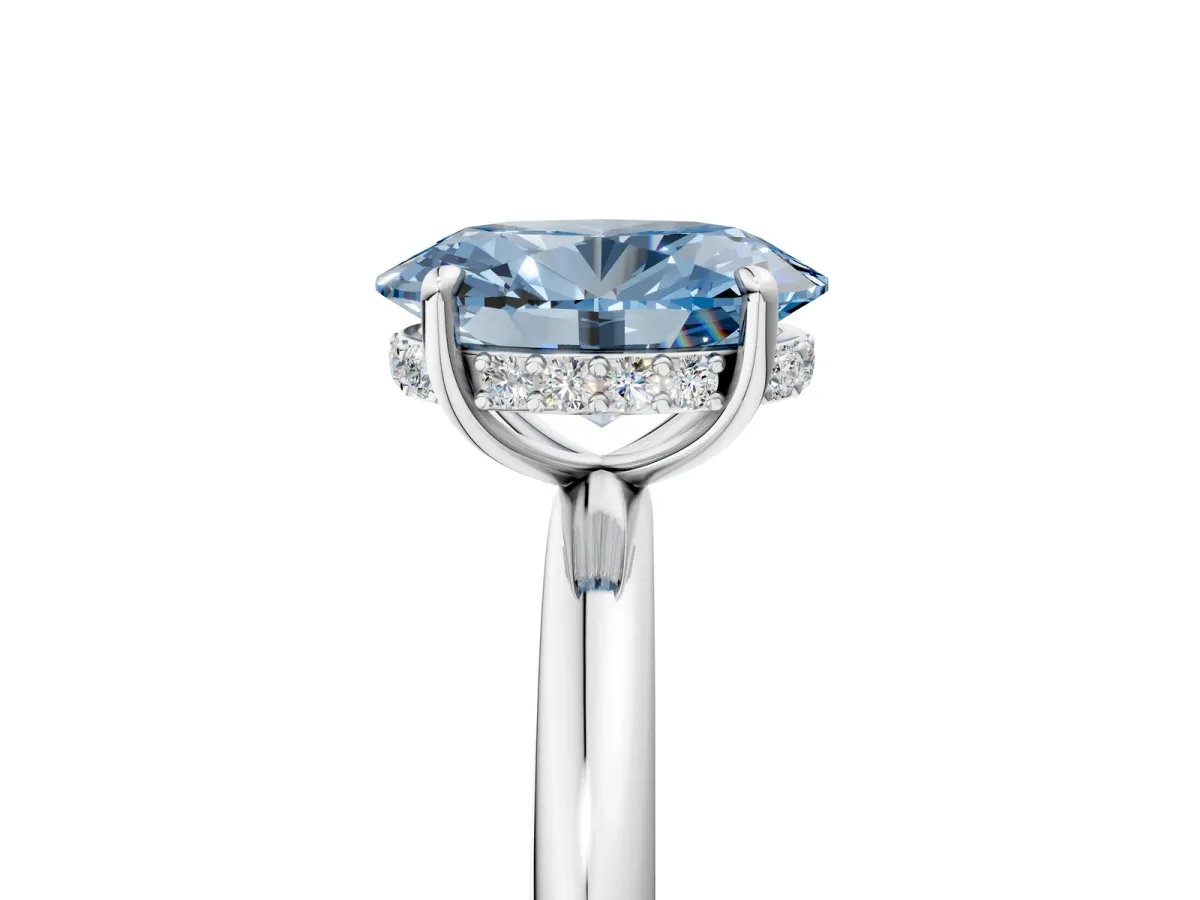 Fancy Blue Oval Cut Diamond Solitaire Ring with Thin Band and Four-Prong Setting White gold