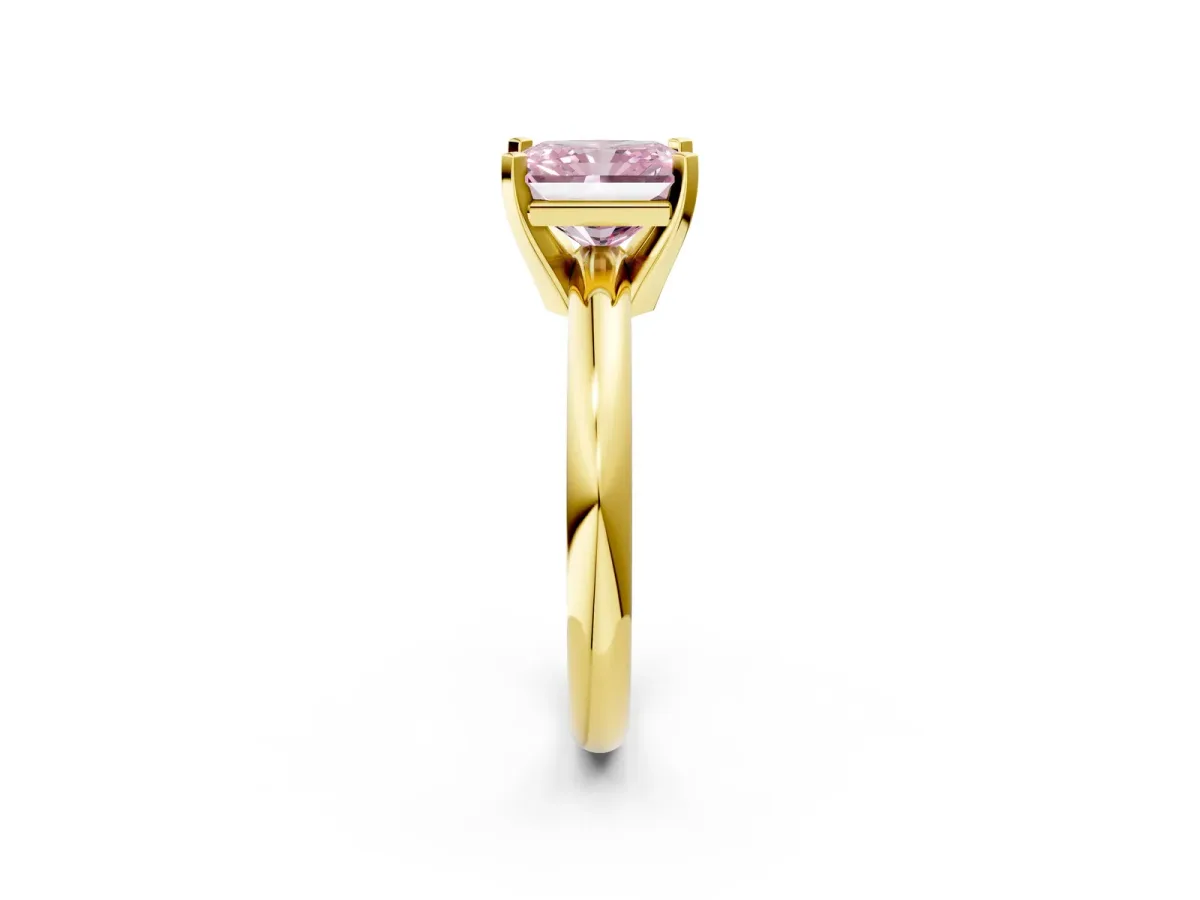 Fancy Pink Radiant Cut Diamond Solitaire Engagement Ring with Round Band and Four-Prong Setting Yellow gold