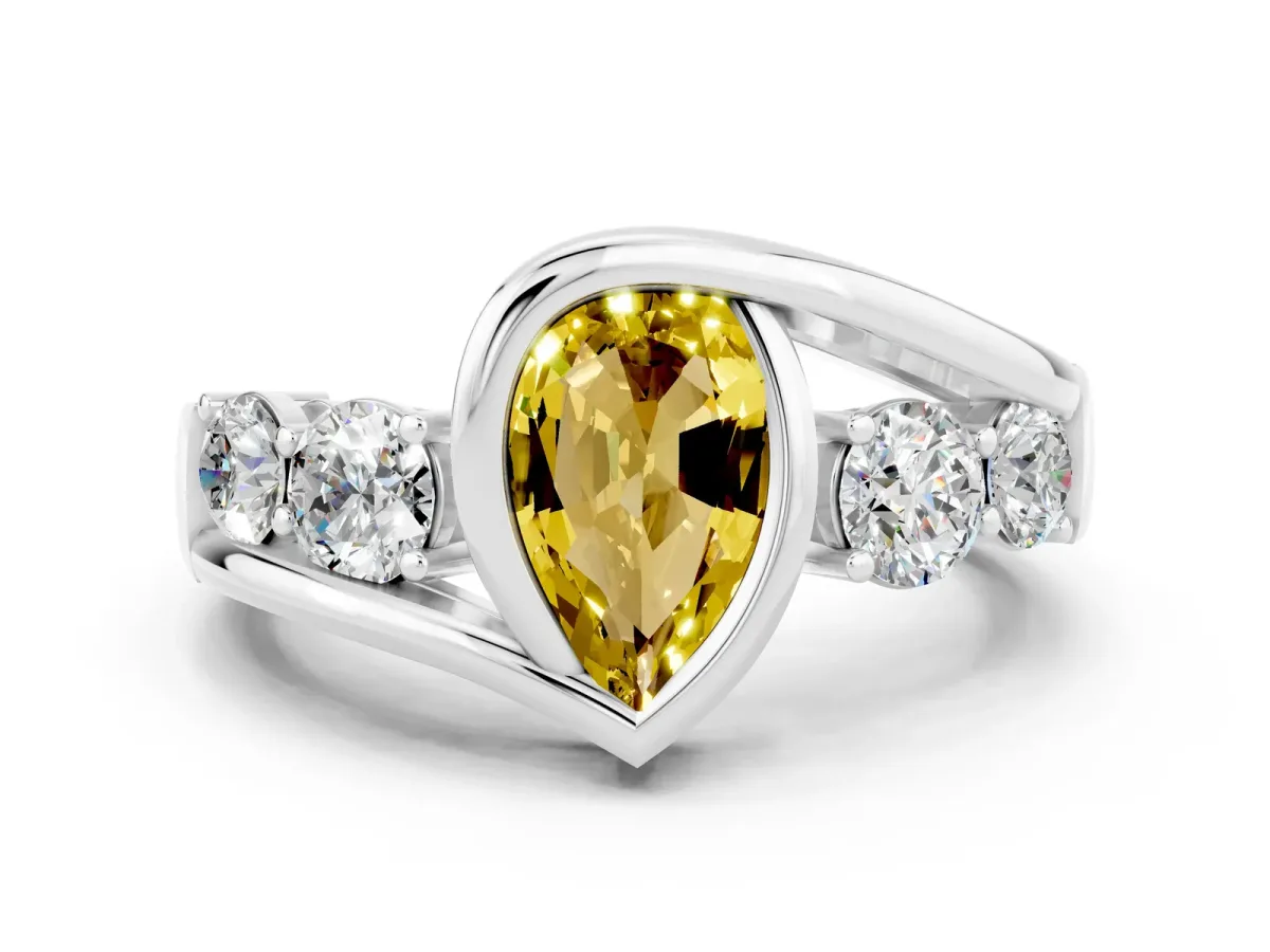 Bezel Set Pear Cut Yellow Sapphire Bypass Ring with Round Accents Platinum