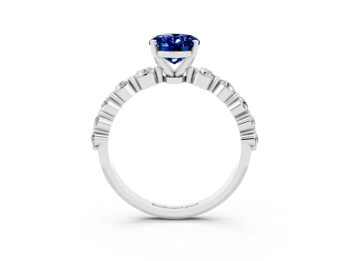 Oval Cut Solitaire Blue Sapphire Ring with Pave Band and Four-Prong Setting Platinum