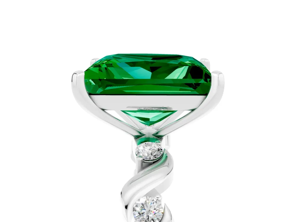Princess Cut Emerald Solitaire Twisted Band with Round Accents and Prong Setting Silver
