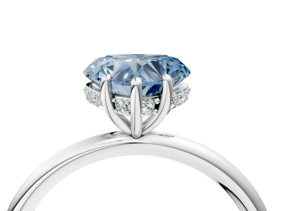 Fancy Blue Heart Cut Solitaire Diamond Ring with a Classic Band and Four-Prong Setting Platinum