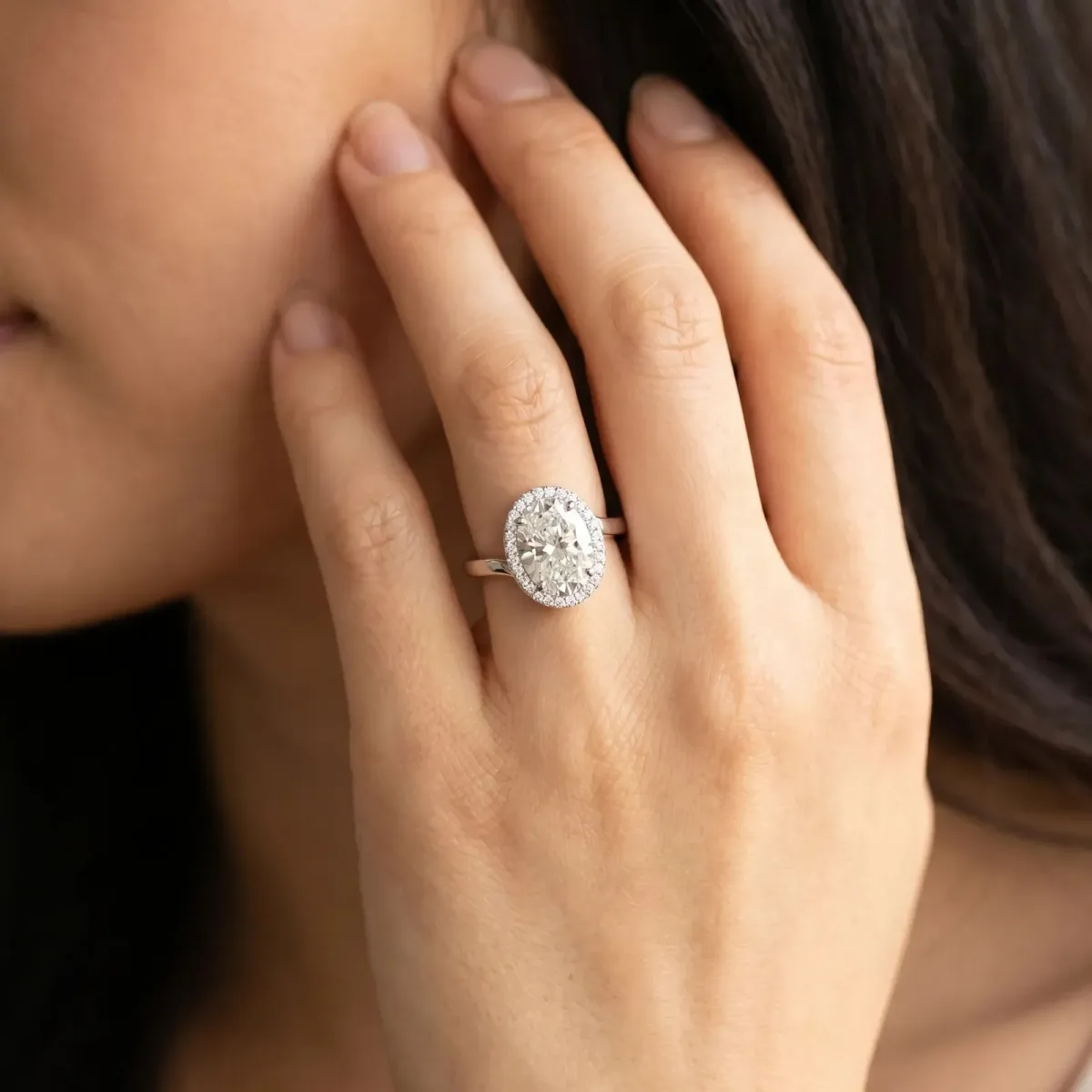 Oval Cut Diamond Bezel Halo Ring with Plain Band Platinum
