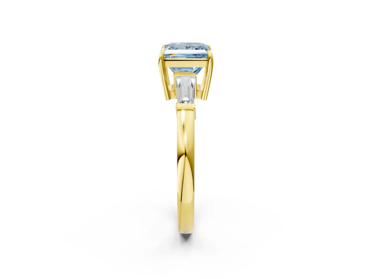 Fancy Blue Princess Cut Diamond Three-Stone Ring with Tapered Baguette Side Stones and Prong Setting Yellow gold