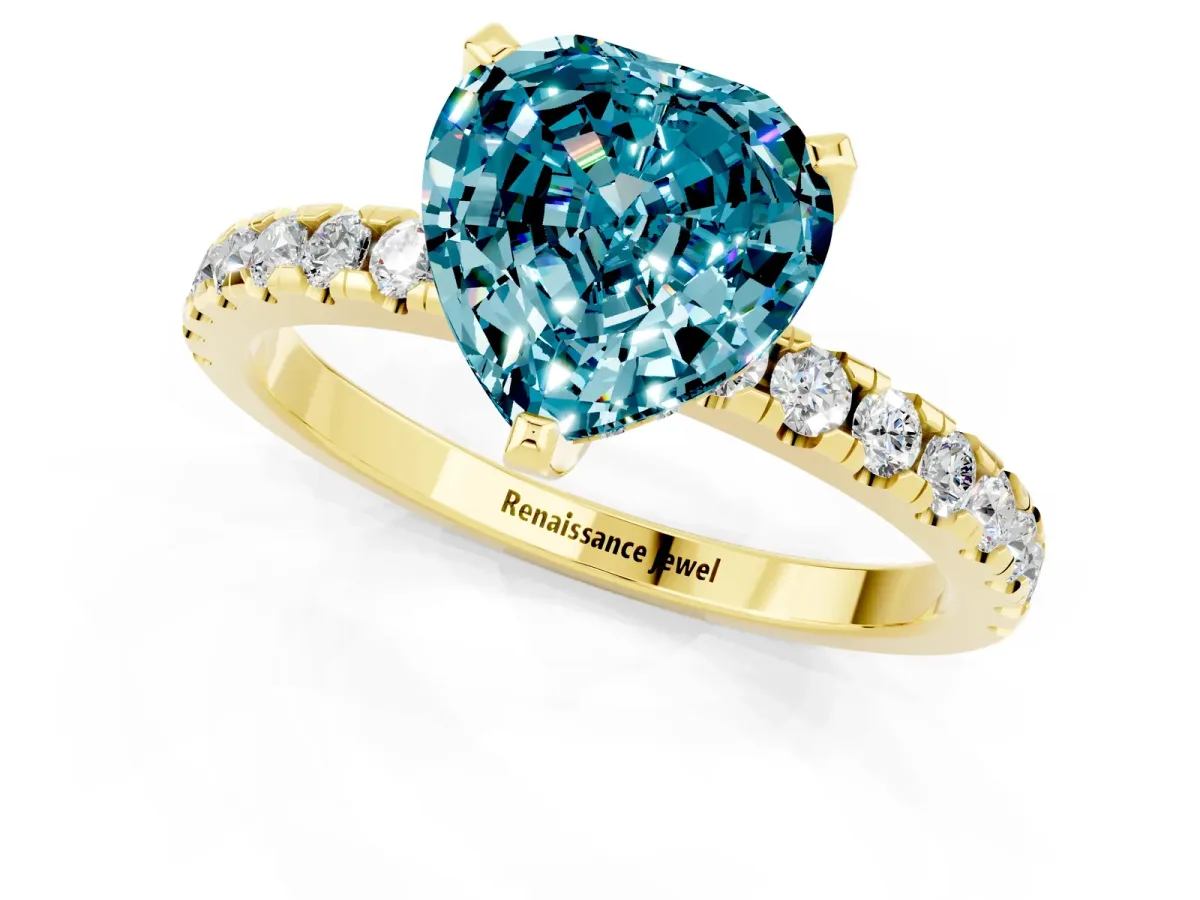 Heart Cut Blue Topaz Solitaire Ring with Round Pavé Band and Four-Prong Setting Yellow gold